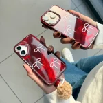 قاب چری براش طرح پاپیونی با آویز زنگوله ای مناسب گوشی آیفون - Image 3