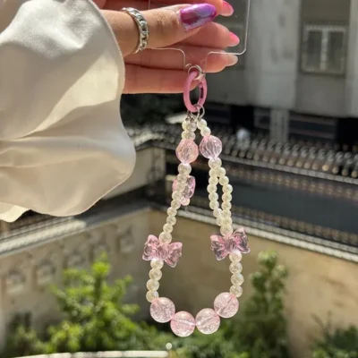 بند آویز مدل مروارید و پاپیون صورتی